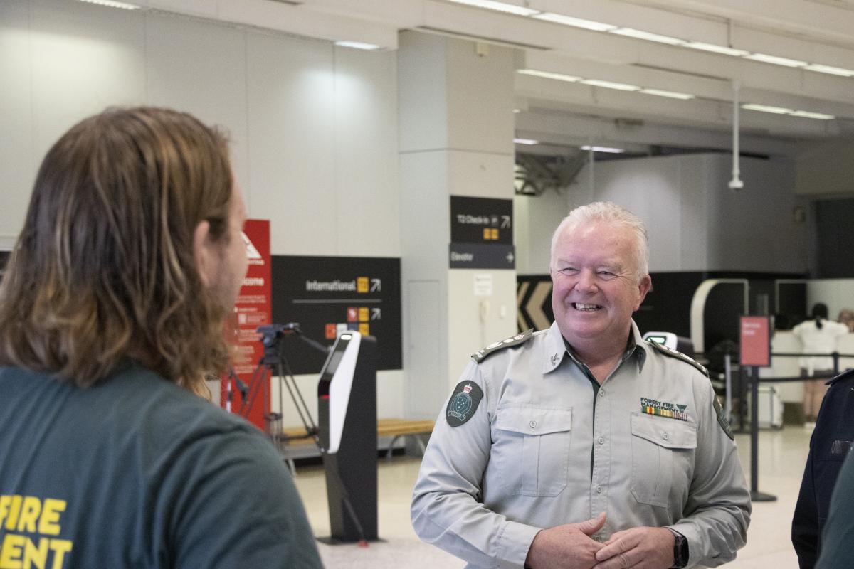FFMVic Chief Fire Officer, Chris Hardman AFSM with FFMVic firefighters at Melbourne Airport.